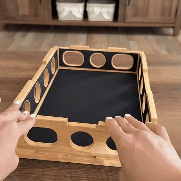 A cat reaching into the Pawdicure box for a treat